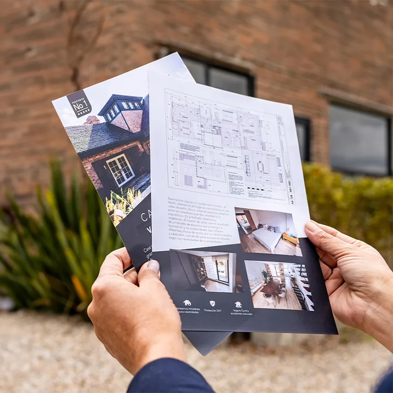 Finished full-bleed architectural drawings and real estate brochures printed on Ricoh Pro production press