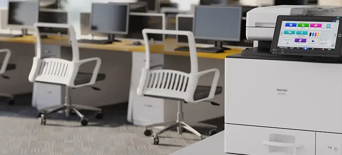 Open plan office with a Ricoh colour printer
